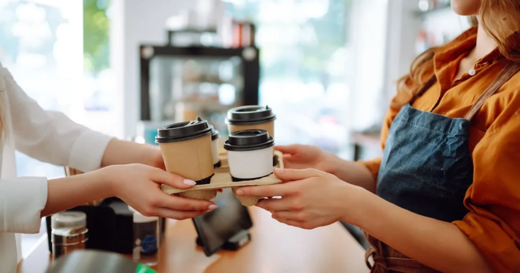 technology tips for small business owner using a laptop and card reader at checkout